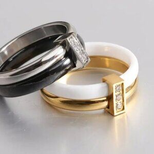 Elegant Gold, Silver, and Black Ring Set